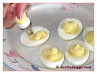 Piping the eggs into the shell